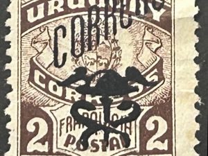 Sello Uruguay 1947 - Emblema Postal con sobre impresión Símbolo Correos, 2 céntimos Marrón