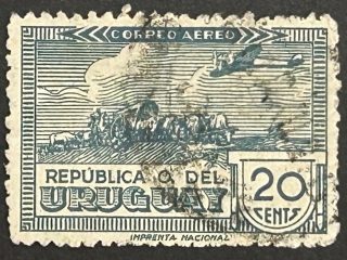 Sello Uruguay 1939 - Avion sobre Escultura de Carreta - 20 cents, azul, usado